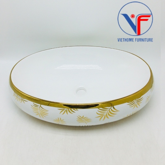 Lavabo hình oval họa tiết lá cọ màu vàng bóng