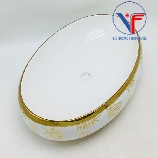 Lavabo hình oval họa tiết lá cọ màu vàng bóng