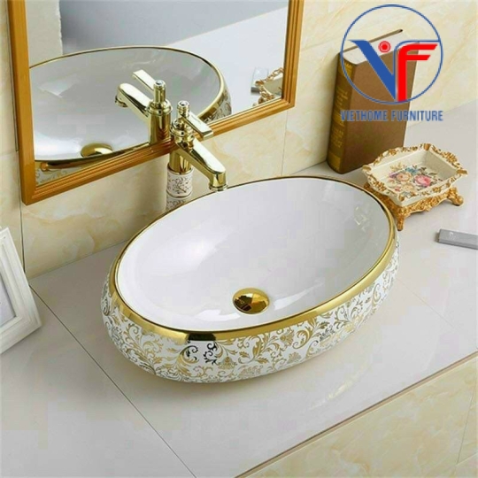 LAVABO ĐẶT BÀN ĐÁ HÌNH OVAL HOẠ TIẾT HOA VÀNG