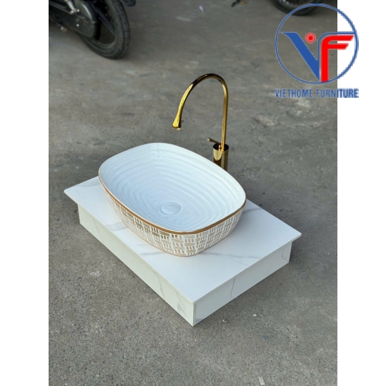 Lavabo đặt bàn màu trắng họa tiết màu vàng