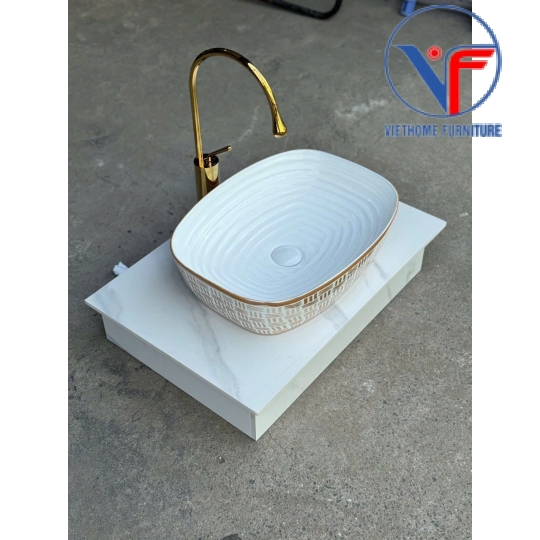 Lavabo đặt bàn màu trắng họa tiết màu vàng