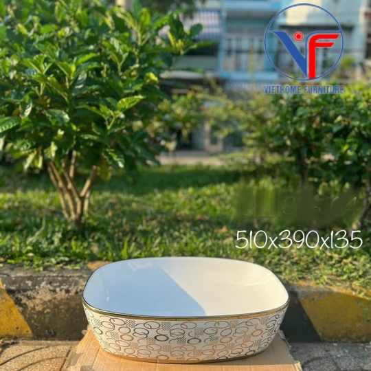 Lavabo đặt bàn màu trắng họa tiết màu vàng bóng
